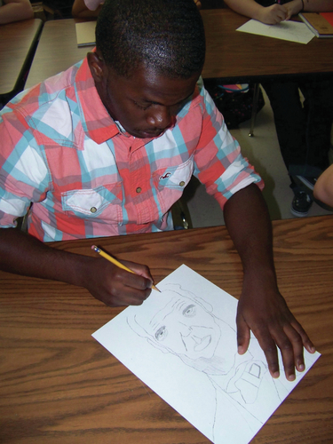 Star City art students learn to draw upside down