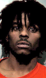 Convicted felon accused of having gun