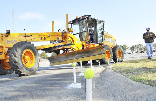 ROADEO’ DRIVE  State highway department’s road crews lasso fun while competing, honing equipment skills
