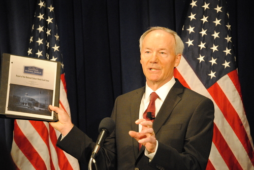 Hutchinson says armed school personnel would improve safety
