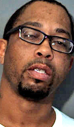 Parolee accused of carrying gun
