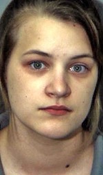 Female arrested in alleged theft of cash, lottery tickets