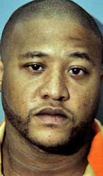 Suspect accused of pointing gun at driver