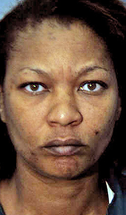 Woman charged with residential burglary