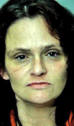 Woman facing felony charge after allegedly spitting on police officer