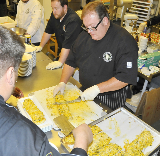 Ayiee! Cajun-flavored fundraiser hits a high note
