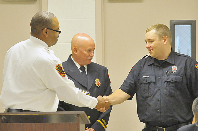 Firefighter honored for actions during house fire
