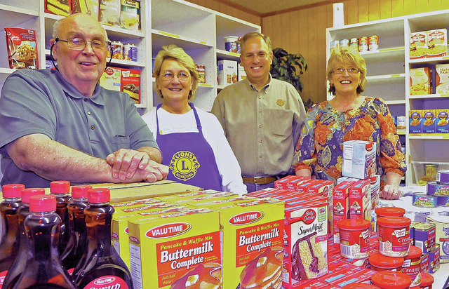 WH Noon Lions Club gives food pantry a helping hand
