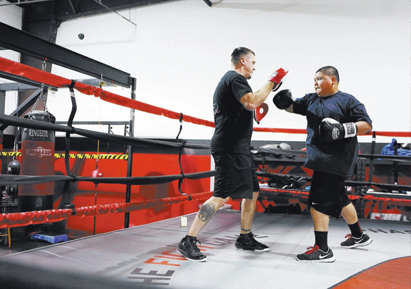 Extra effort helps trainer reach troubled kids