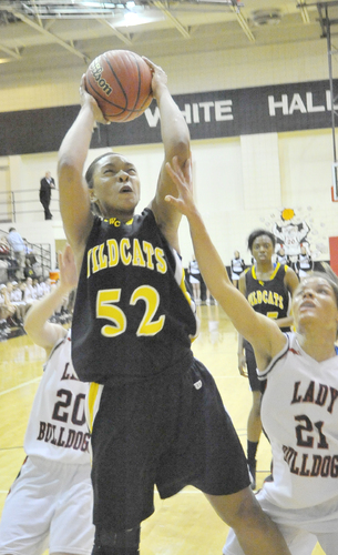 Lady Wildcats leave no doubt in blowout