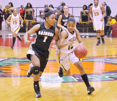 Lady Wildcats escape with victory