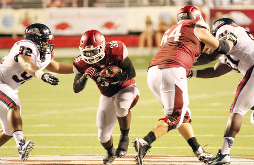 Arkansas survives Samford’s scare