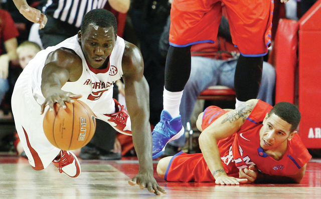 Hogs strong from arc in beating Mustangs