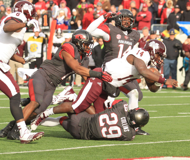 Trick play trips Arkansas again