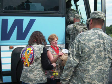 U.S.D. 1812 members provide snack bags, flags to deploying soldiers