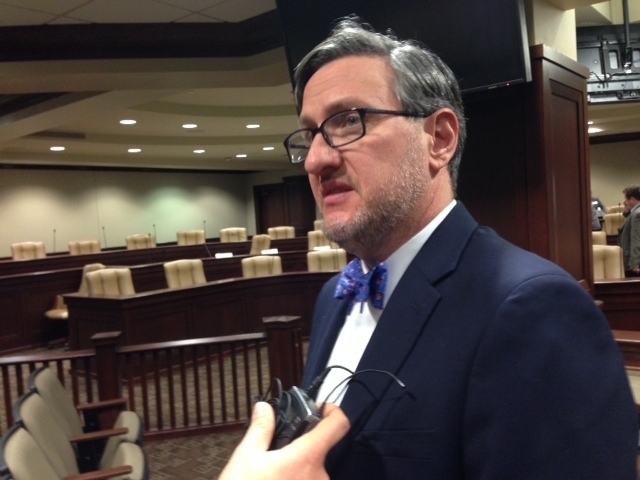 Stephens Inc. alleges conflict of interest by state securities commissioner