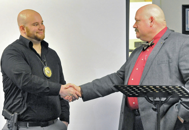 Officer cleared in suspect’s death, honored for his actions