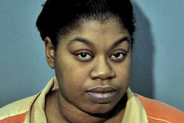Woman accused of hitting man with vehicle
