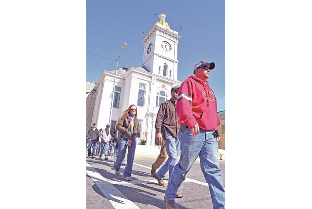 Open-carry supporters march in downtown PB