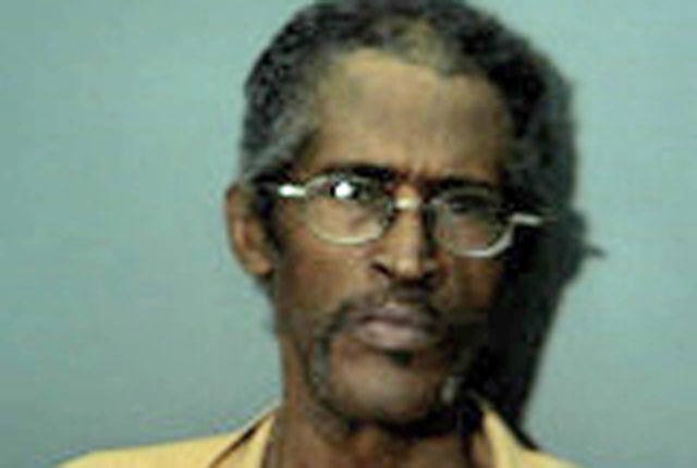 Man arrested after allegedly seen inside vehicle at closed car lot