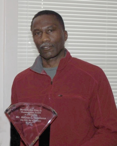 Simmons receives PB Arsenal humanitarian award