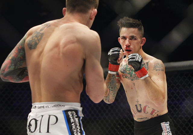 Fallen comrades, mixed-martial arts help Marine beat PTSD