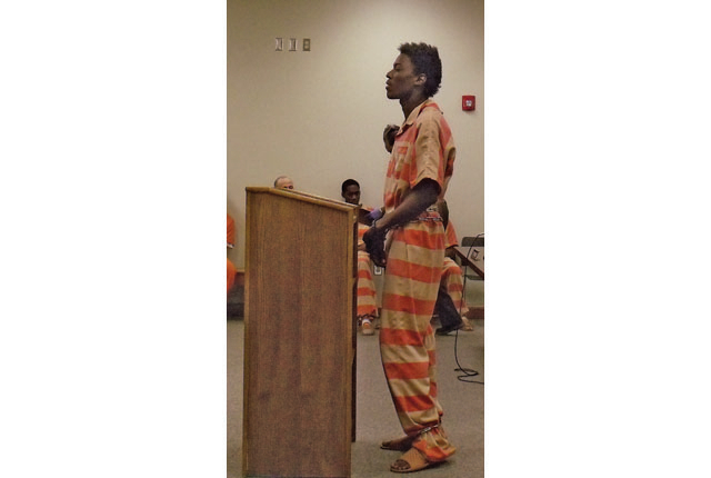 Police say money, gun were motives for murder