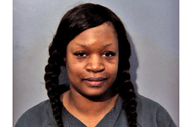 Woman accused of theft, forgery