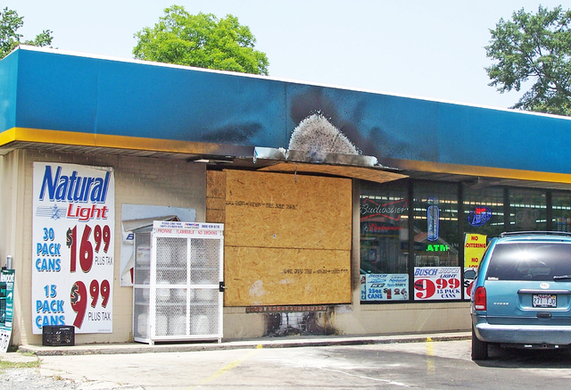 Car runs into convenience store