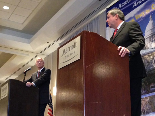 Hutchinson, Ross trade barbs on taxes, attack ads
