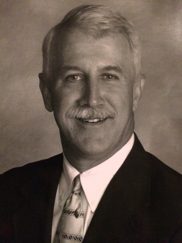 State Land Title group elects Dill president