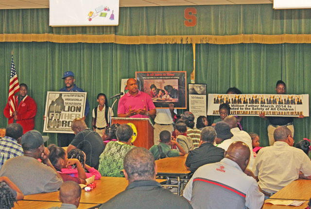 Southwood Elementary School fathers march to pledge responsibility