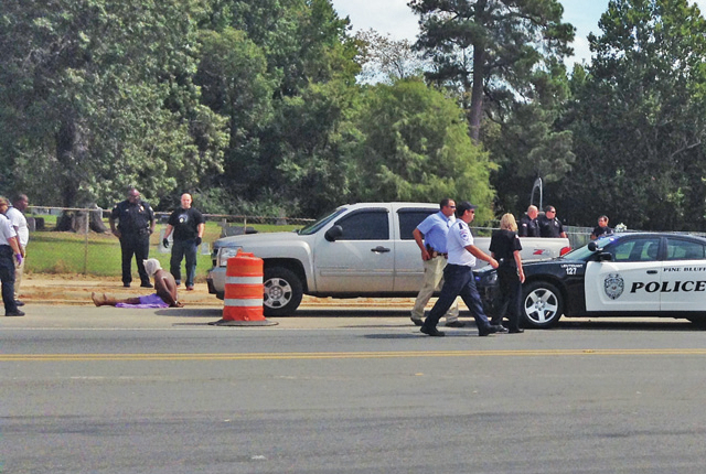 Police arrest naked man on University Avenue