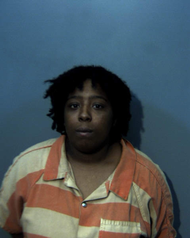 Woman arrested after allegedly hitting man with vehicle