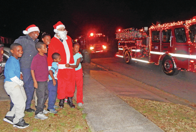 Fire department continues annual tradition with lighted fire truck