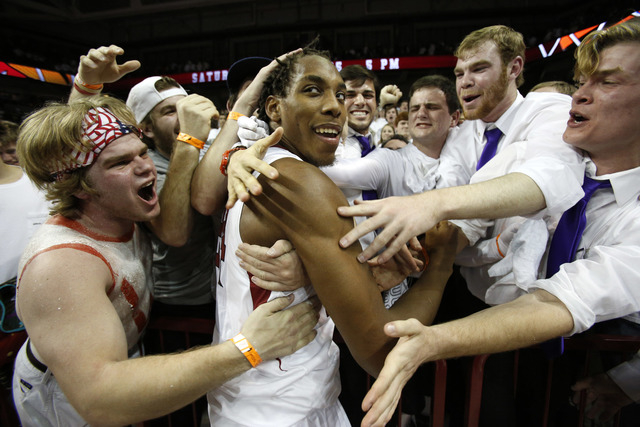 Qualls’ game winning dunk preserves season for Hogs