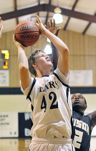 Missing coach, Bears don’t falter at home