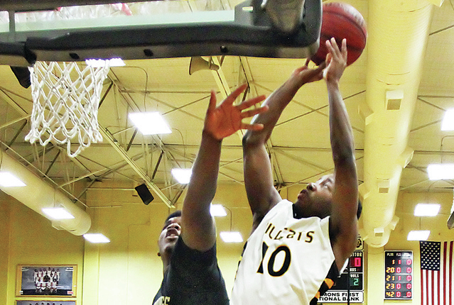 Wildcats debut zone defense in win over Trojans