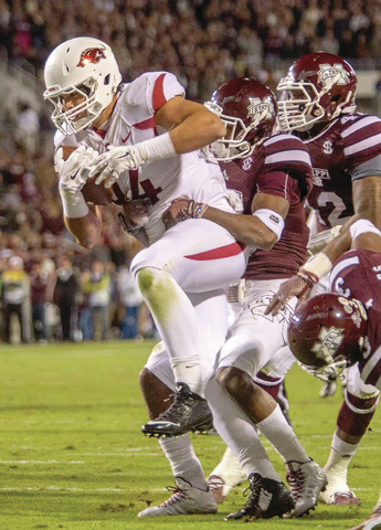 Another upset narrowly dodges Hogs