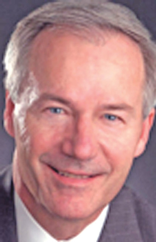 Hutchinson orders hiring freeze, review of new agency rules