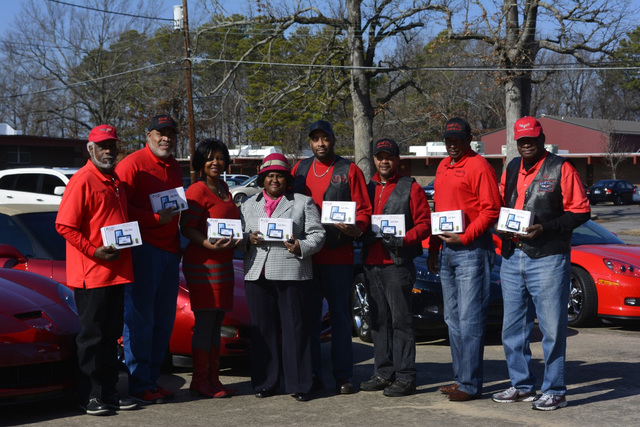 Corvette Club presents gifts to Oak Park, Broadmoor schools