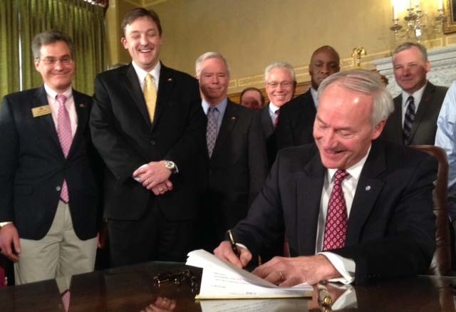 Governor signs middle-class tax cut into law