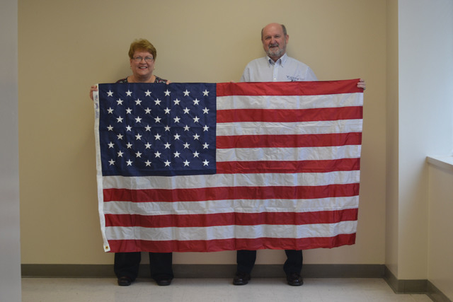 Agency presents flags to Ridgway schools
