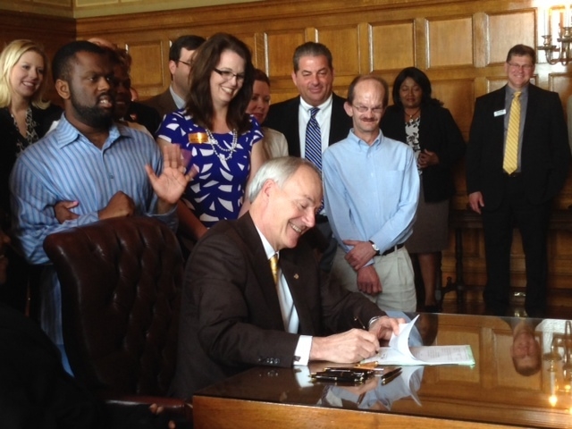 Hutchinson signs bill to allow tax-free savings for disabled