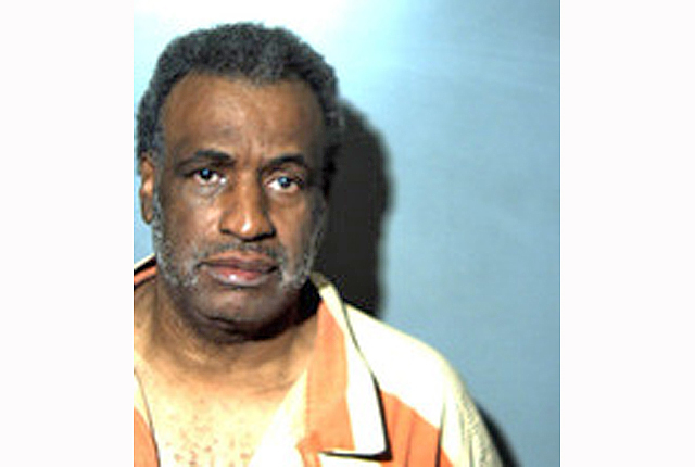 Man arrested after allegedly pointing gun at two