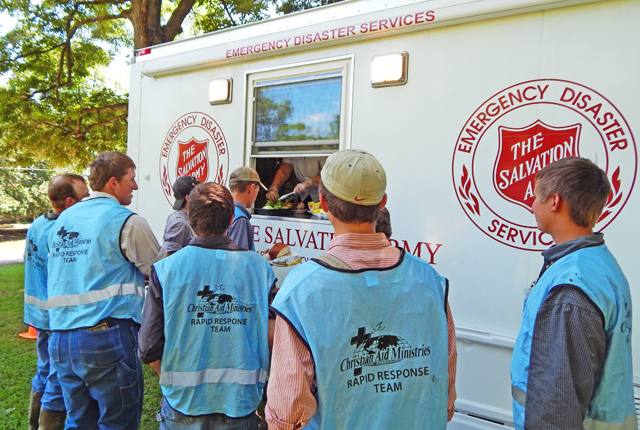 Mennonite volunteers helping in cleanup