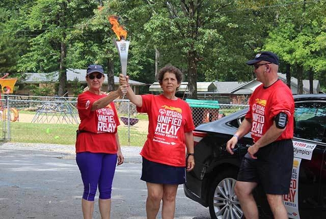 Special Olympics torch carried through White Hall and Pine Bluff