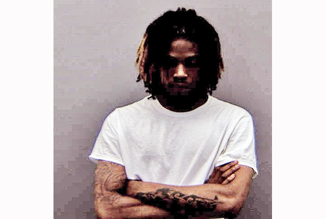 Man arrested after allegedly firing shots over woman’s head