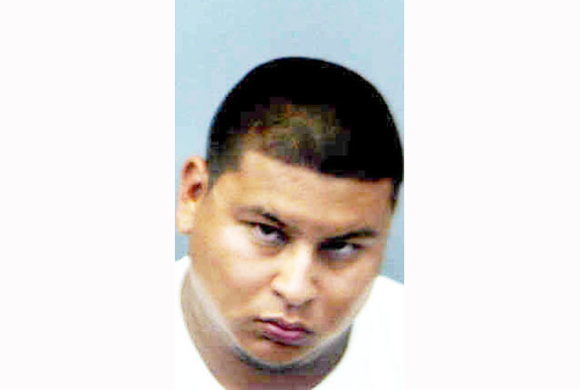 Suspected drugs, gun in truck lead to arrest