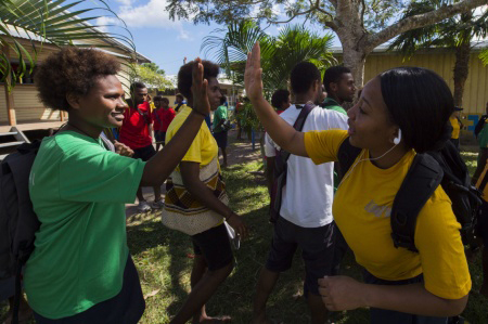 PB sailor works with New Guinea children
